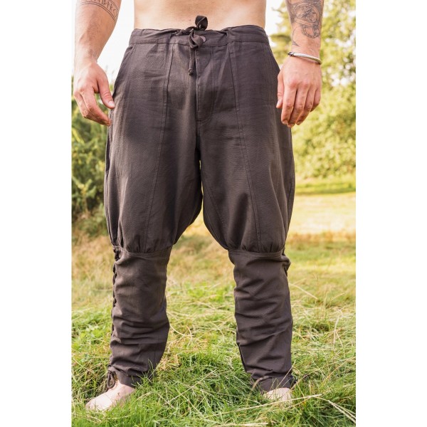 Pants with waist drawstring and side lacing